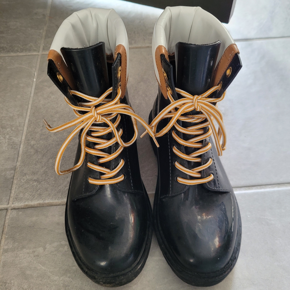 See By Chloe Black and Tan Winter Boots
